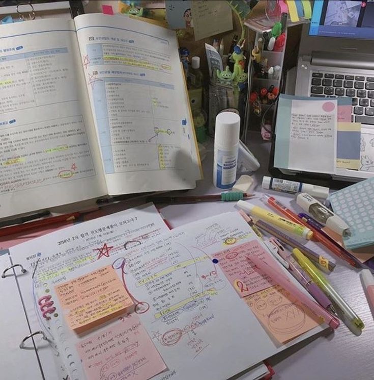 an open book sitting on top of a desk