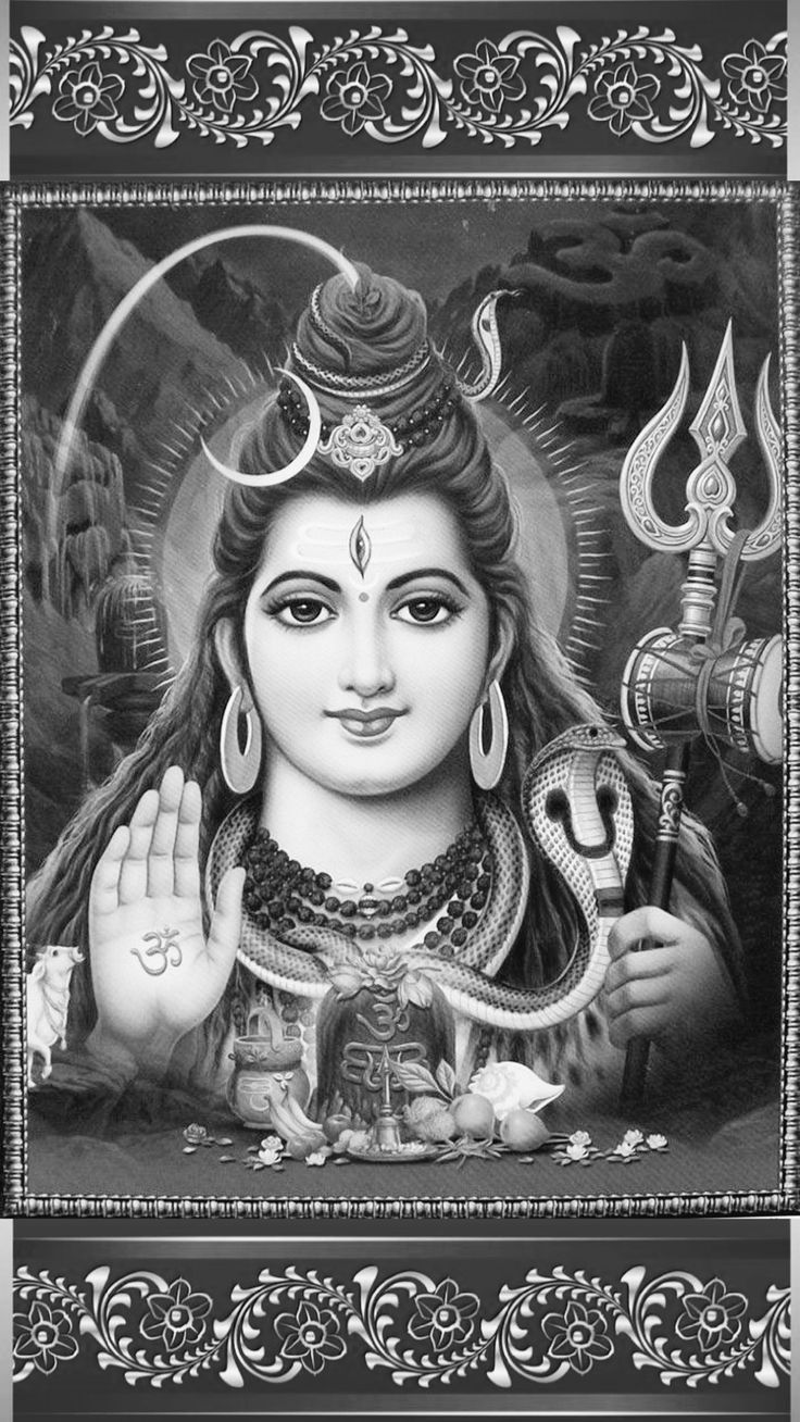 the hindu goddess in black and white with her hands clasped up to her heart, surrounded by snakes