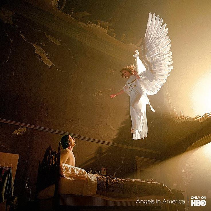 an angel flying over a bed in a room