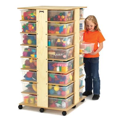 This innovative tower puts an end to disorganization and wasted space. With its modular design and ample storage capacity, you can neatly tuck away supplies, toys, or any other items, freeing up precious square footage in your space. And thanks to the convenient casters, you can easily move it around to suit your changing needs. Jonti-Craft Bins Included: With clear tubs | Jonti-Craft 32 Tub Tower 54.0 H x 27.0 W x 27.0 D in brown / white in Natural | 53.5" H X 27" W X 27" D | Wayfair Preschool Storage, Wood Tub, Mobile Tower, Clear Bins, Classroom Storage, Cubby Storage, Mobile Storage, Storage Towers, School Furniture