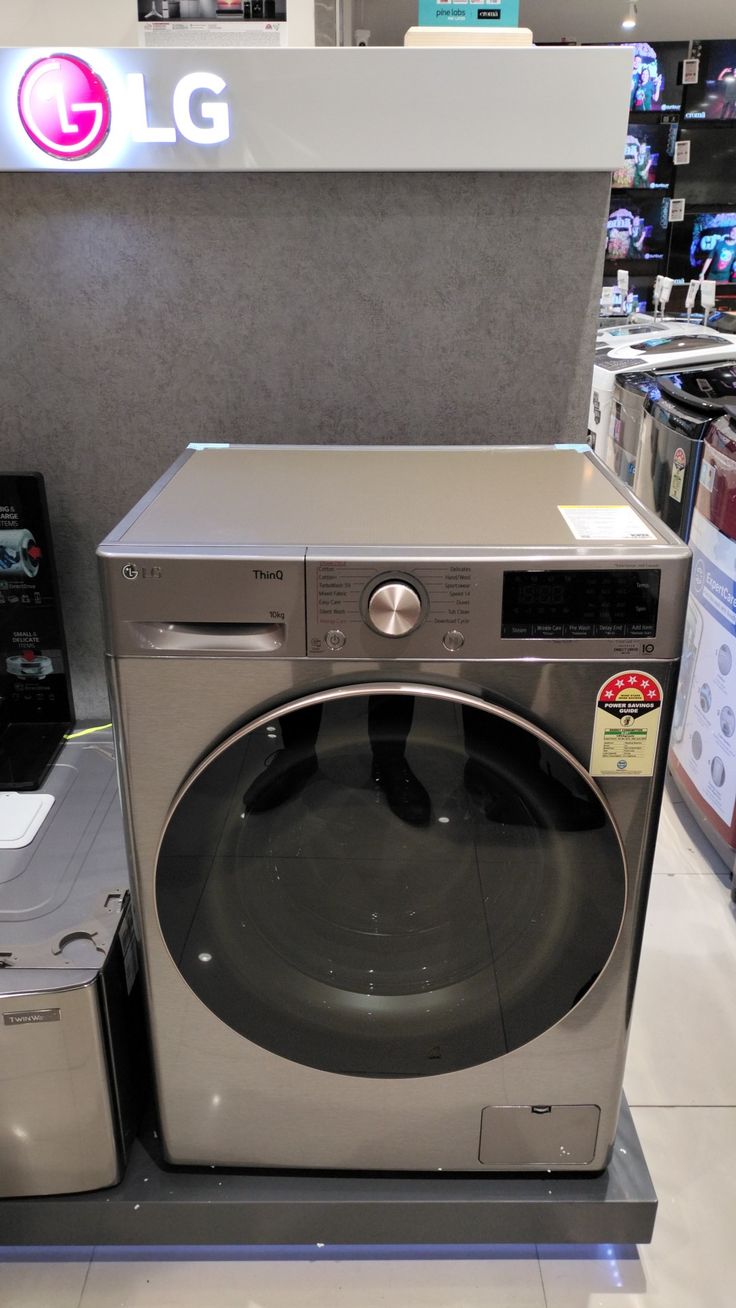 an lg washing machine on display in a store