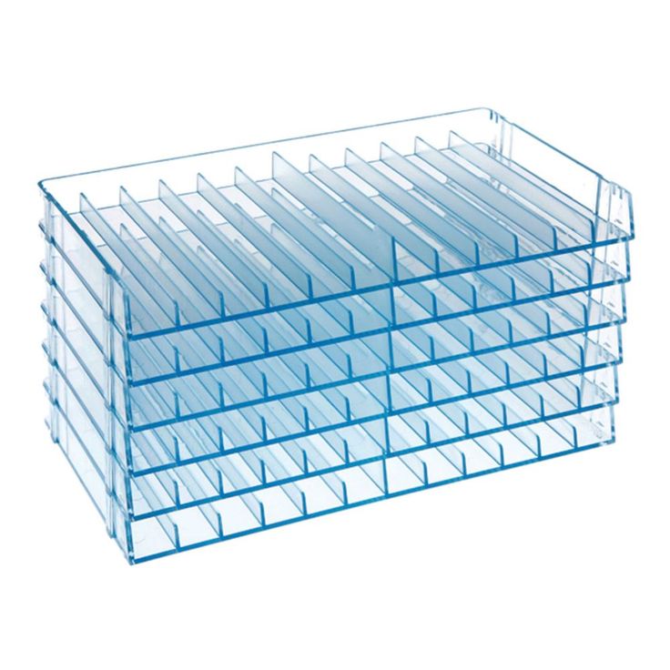 a stack of clear plastic drawers on a black background