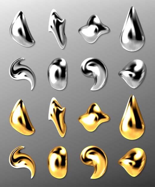 gold and silver metal shapes on a gray background stock photo - 1309782