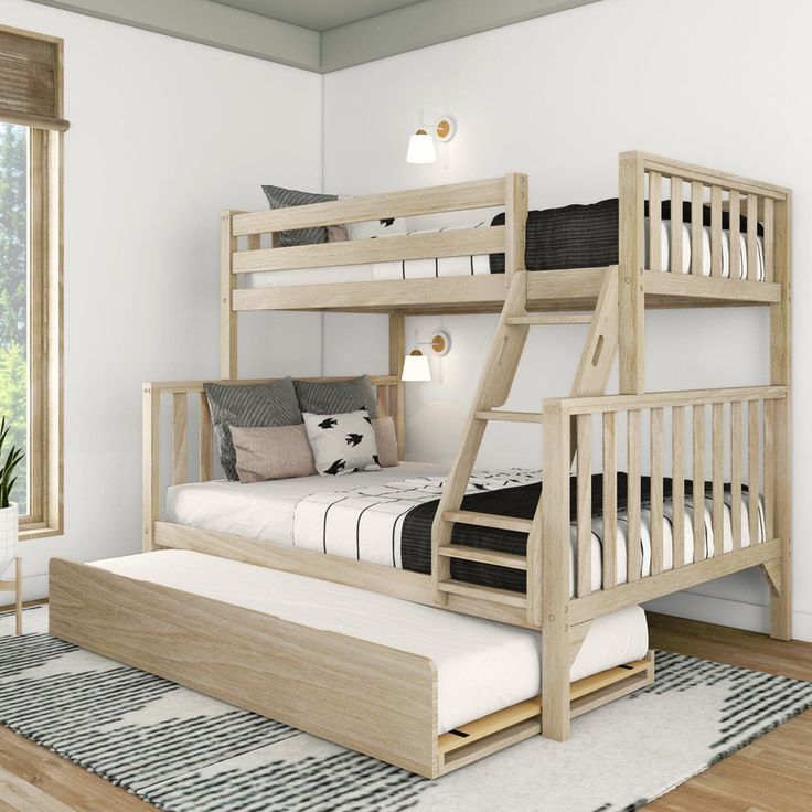 there is a bunk bed with a trundle on the bottom and stairs to the top