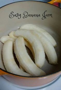 sliced bananas in a bowl with the words easy banana jam written on it's side