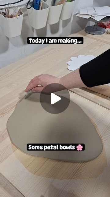 someone is making some petal bowls out of plywood