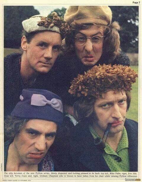 three men with hats on their heads posing for the camera