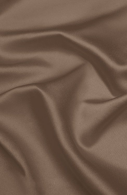 a close up view of a brown silk fabric with very soft folds and wrinkles