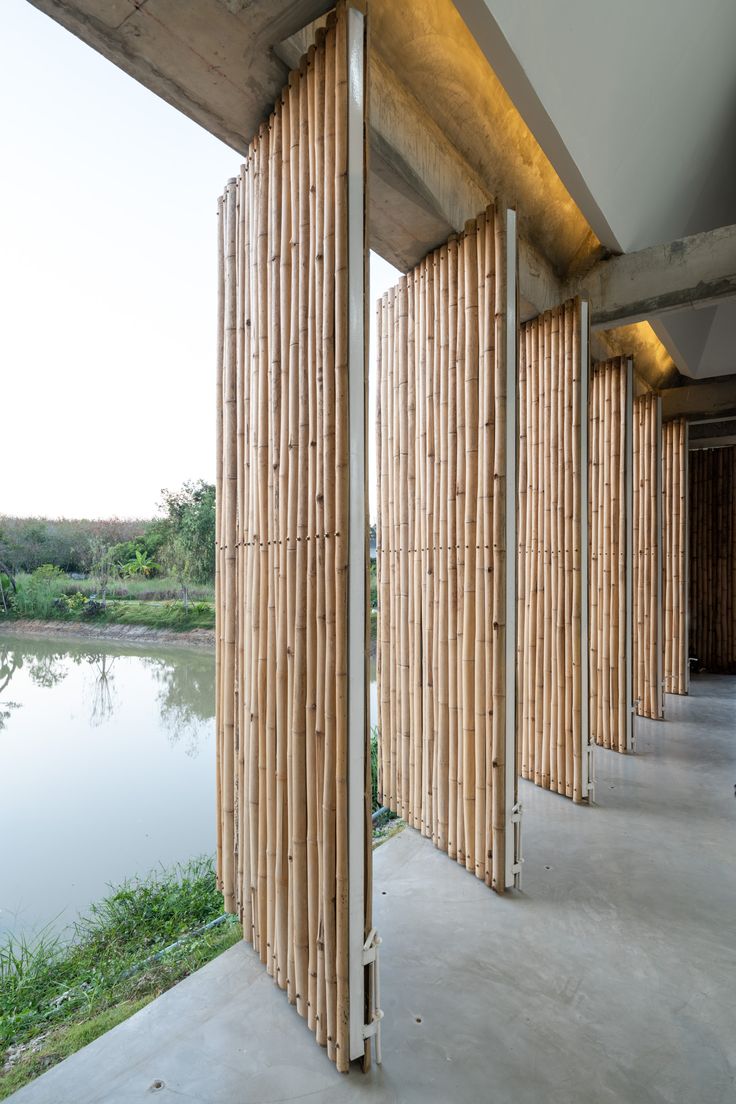 Furnish Studio | 11.29 Studio Batten Walls, Bamboo Roof, Bamboo Building, Bamboo House Design, Wall Signage, Bamboo Architecture, Bamboo Construction, Bamboo House, Artist Photo