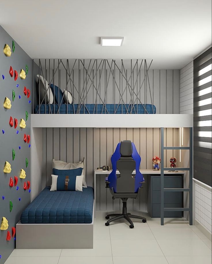 a bedroom with bunk beds, desk and climbing wall