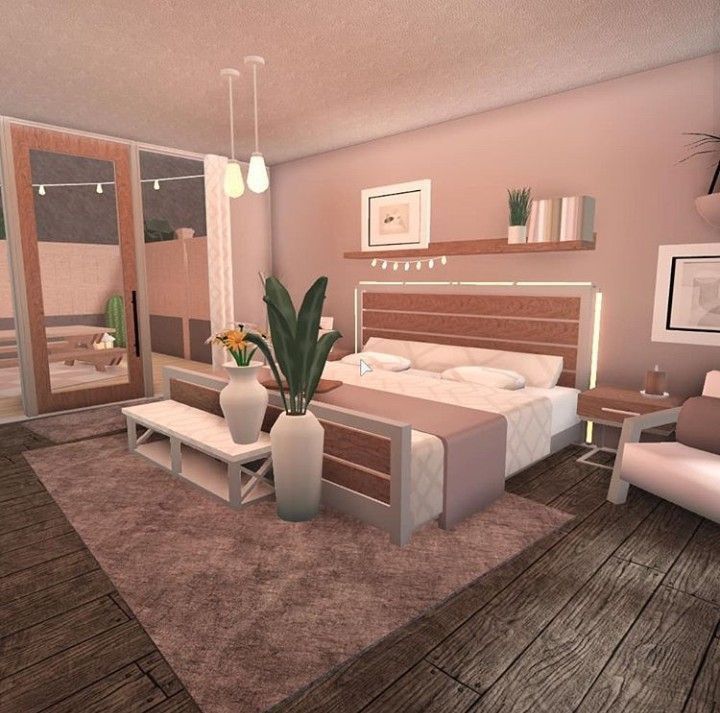 a bedroom with a bed, chair and table in it