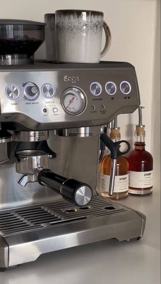 an espresso machine sitting on top of a counter