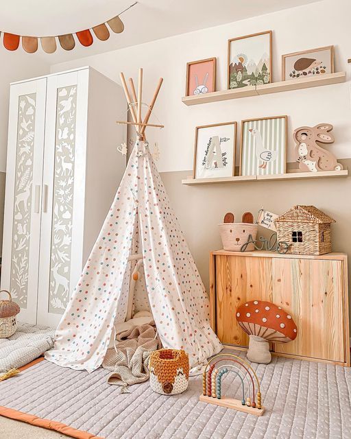 a child's bedroom with a teepee tent and toys