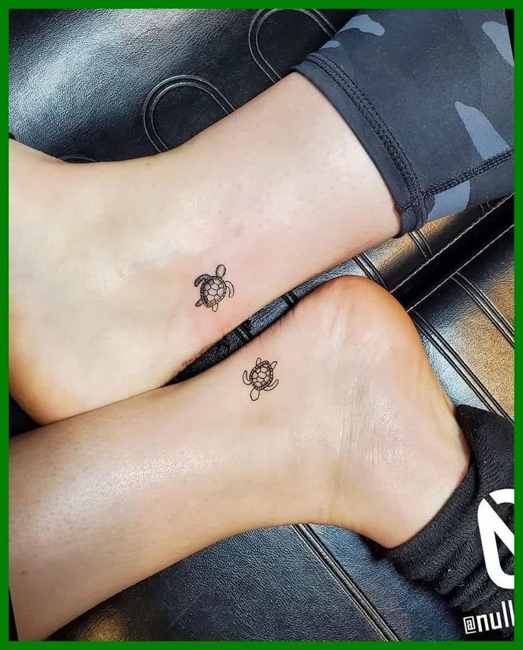 two people with matching tattoos on their feet, one has a turtle and the other is a turtle