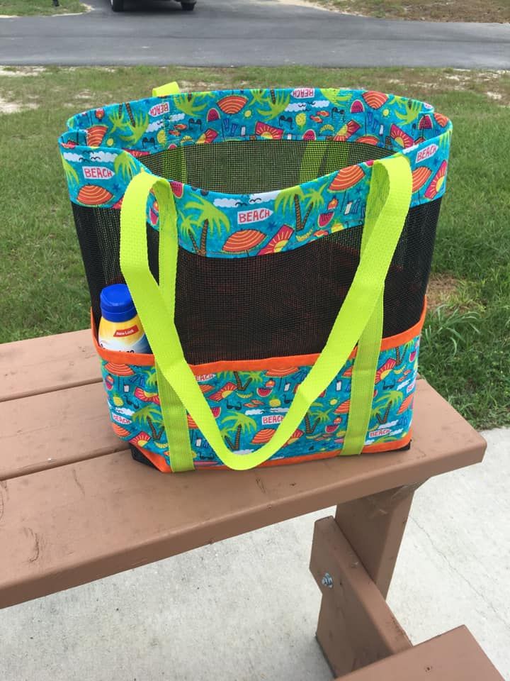 a large bag sitting on top of a wooden bench