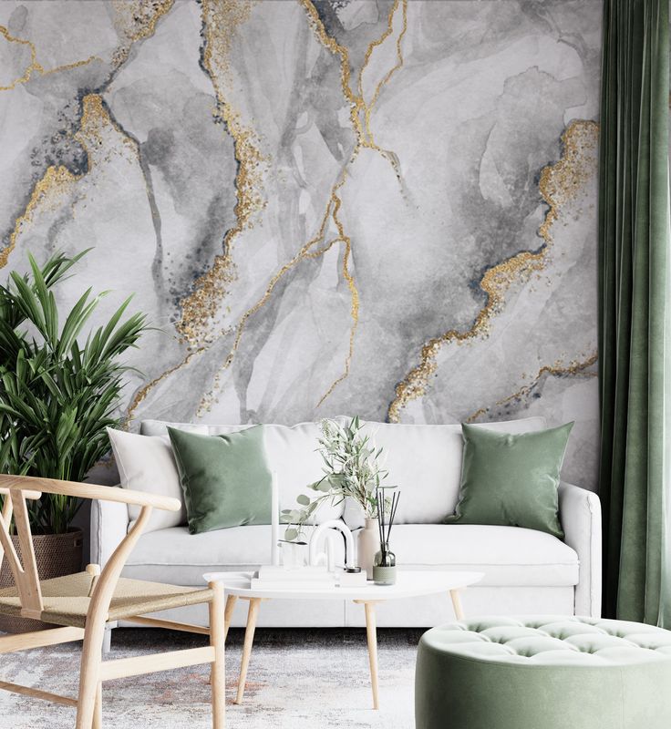 a living room filled with furniture and a large marble wall behind the couch is a green plant