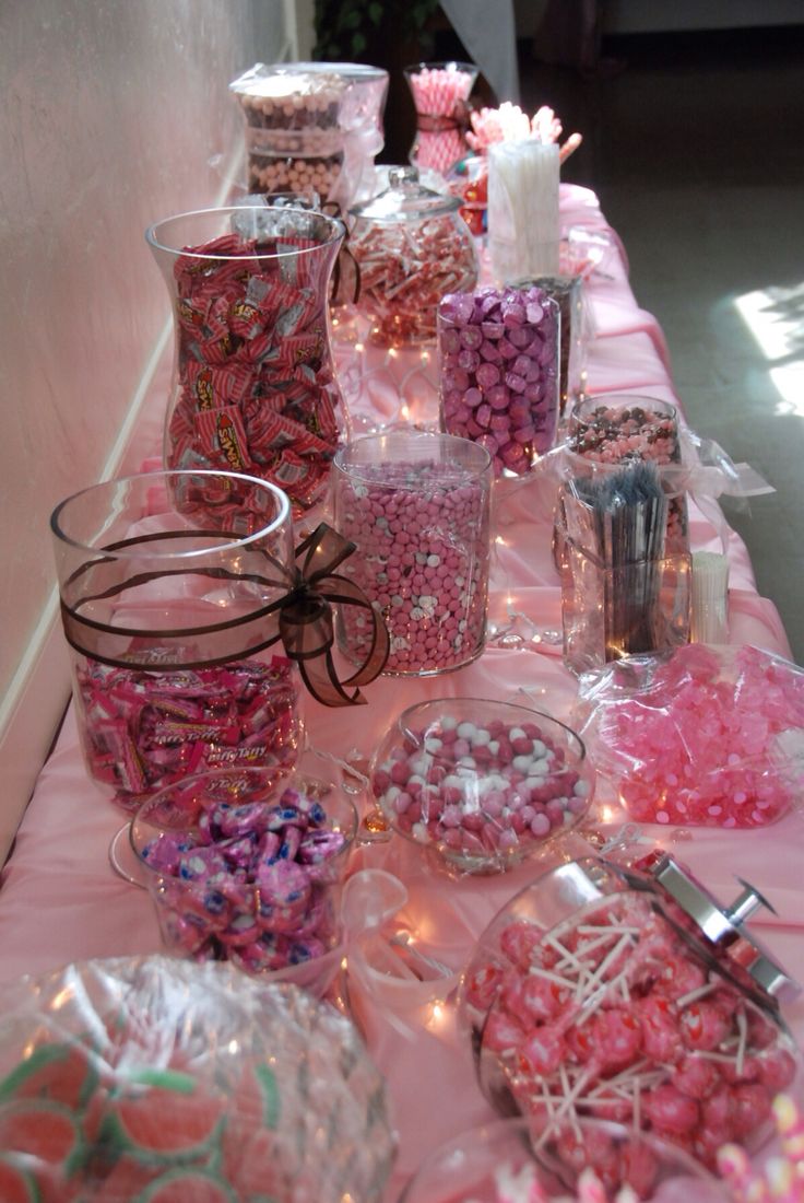 a table topped with lots of candy and candies