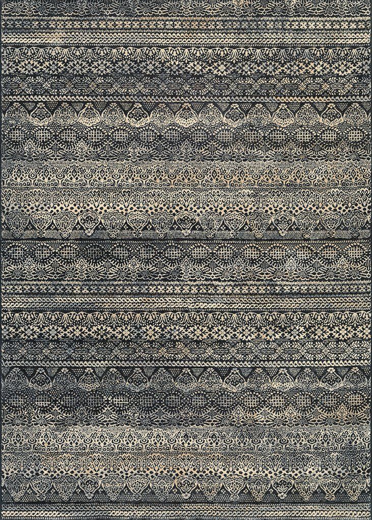 an area rug with different patterns and colors