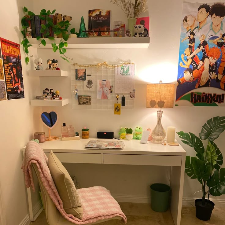 a white desk topped with a chair next to a potted plant and a lamp