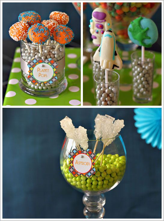 there are some candy and candies in glass vases