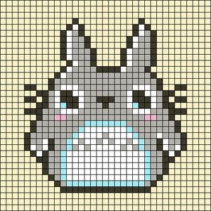 a cross stitch pattern with an image of a totoro face in the center