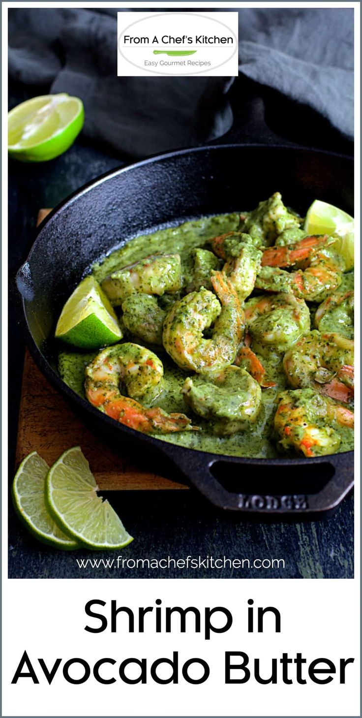 shrimp in avocado butter with limes on the side