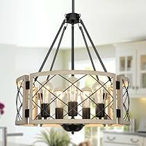 a chandelier hanging from the ceiling in a kitchen