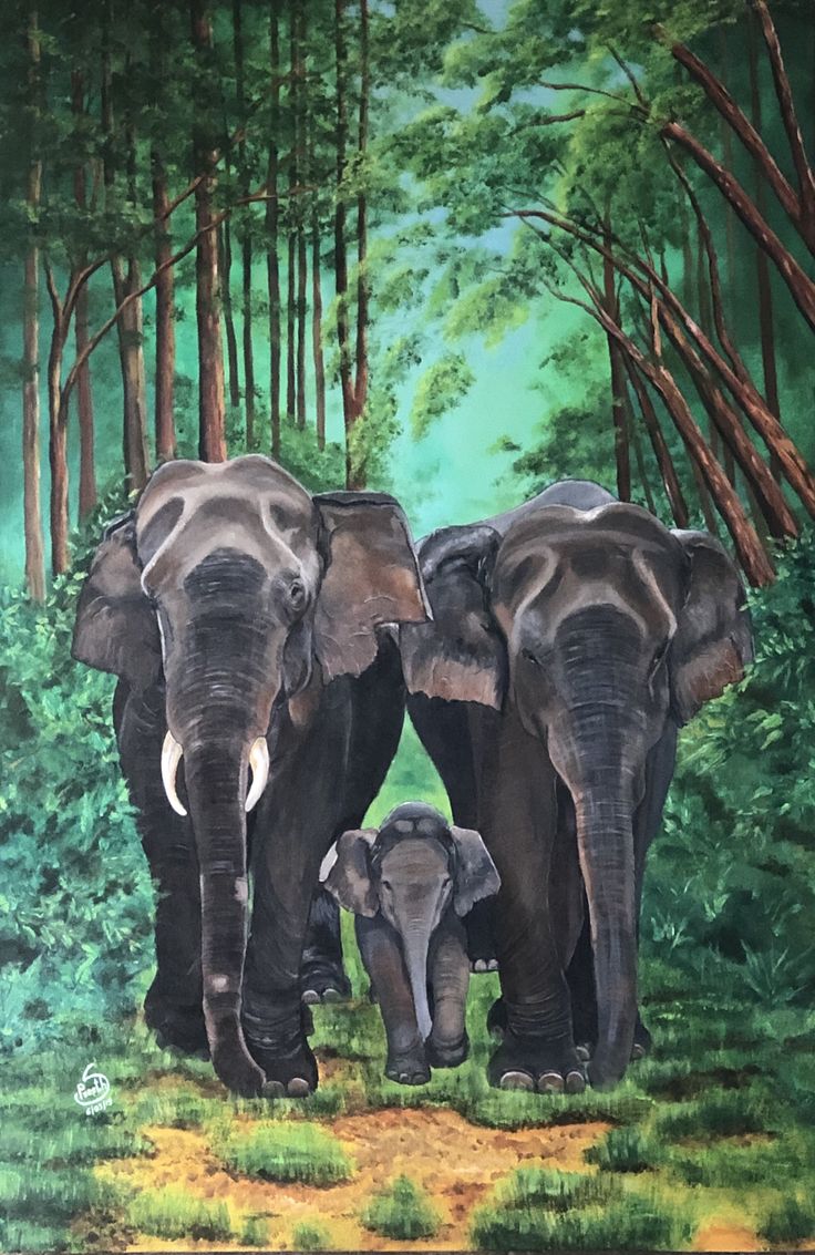 two elephants standing next to each other in front of trees