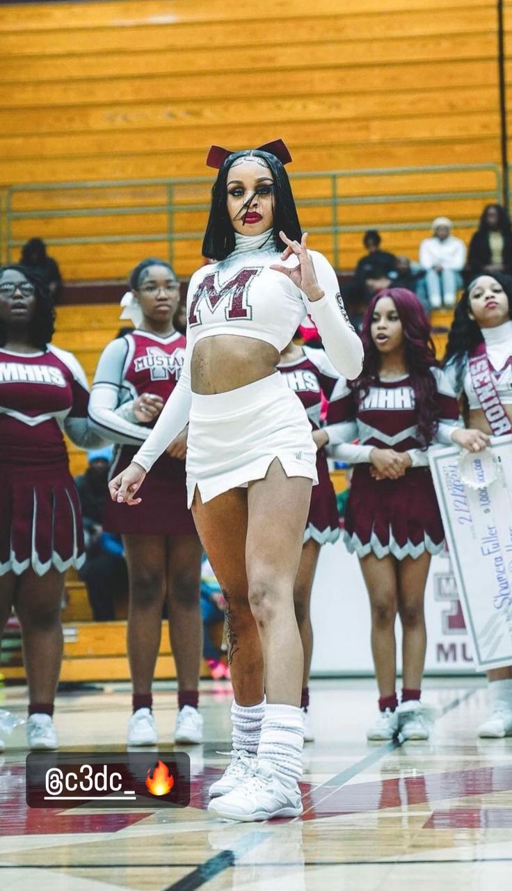 the cheerleaders perform for the crowd