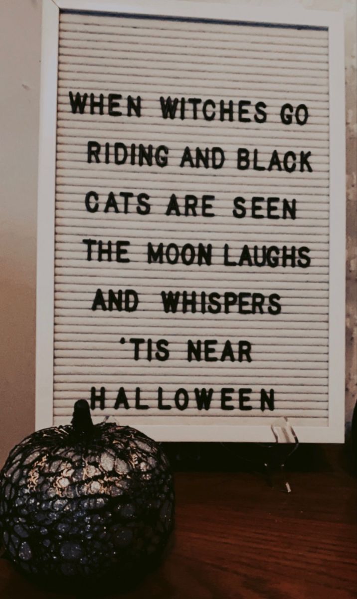 a sign that says when witches go ridding and black cats are seen the moon laughs and whispers'tis near halloween