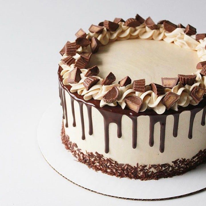 a cake with chocolate and white frosting on top