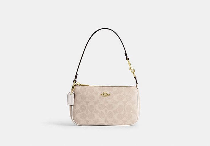 Signature coated canvas Two credit card slots Zip-top closure fabric lining Handle with 6 1/4 drop 7 1/2 (L) x 4 1/2 (H) x 2 (W) Style No. CW426 Coach Nolita 19 White, Coach Bag Nolita 19, Coach Nolita 19, Coach Nolita, Nolita 19, Coach Bags Outlet, Pretty Purses, Dream Bags, Collage Board