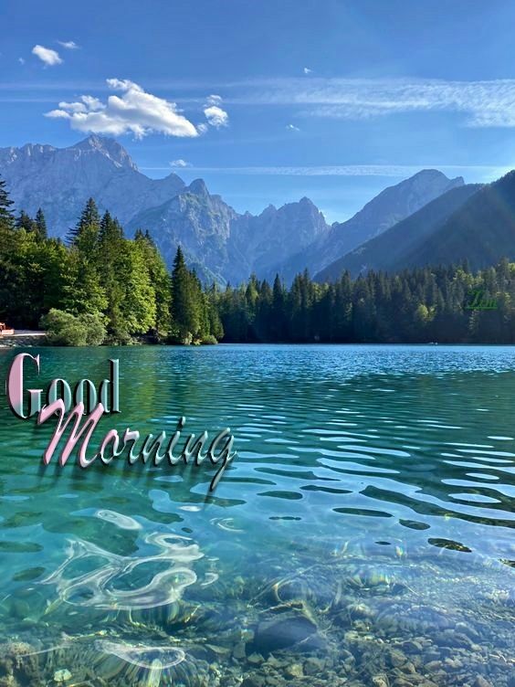 the words good morning are in front of a mountain lake