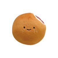 an orange with a face drawn on it's side, sitting in front of a white background