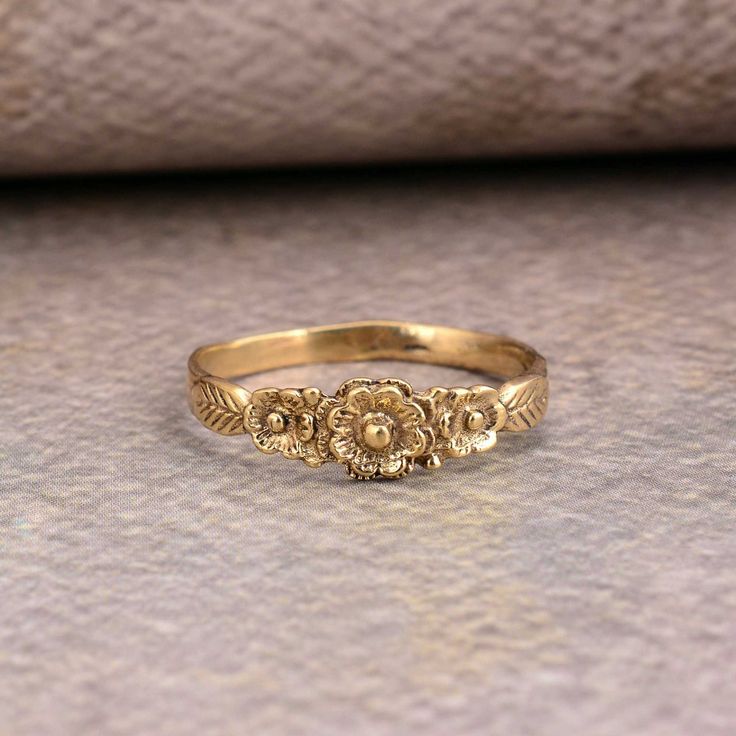 Floral brass ring, Gold Flower ring, Vintage ring, Handmade jewelry, Gift for her, Dainty ring, Boho ring, Women ring, Minimalist Ring 1. Please share your numbers (in personalization box ) as required for shipping address details, and it'll help us to contact you easily. And don't worry about the privacy, we'll keep it safe with us, So try to cooperate with us. :) 2.Customers' satisfaction is our biggest priority, please contact us with any questions/queries for future or existing orders, and we will do our best to make sure you are happy with your order. 3.Please make sure to add the correct address during checkout. You can return your purchased item within 15 days after successful delivery. We offer a 100% "Money Back Guarantee" if you are not satisfied with your purchase. Return charge Cheep Rings, Gold Ring Antique, Cute Rings For Women, Hippy Wedding Ring, Vinatge Rings, Gold Floral Ring, Gold Vintage Jewelry Aesthetic, Gold Western Rings, Vintage Ring Engagement