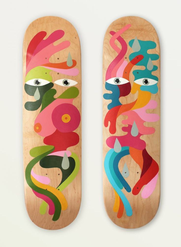 two skateboards with different designs on them, one is made out of wood and the other is painted with acrylic paint