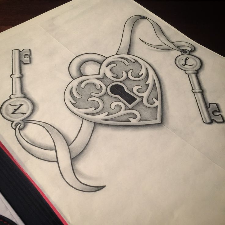 a drawing of two keys and a heart shaped key on top of a piece of paper