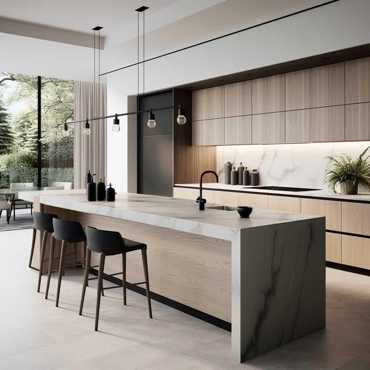 a modern kitchen with marble counter tops and bar stools