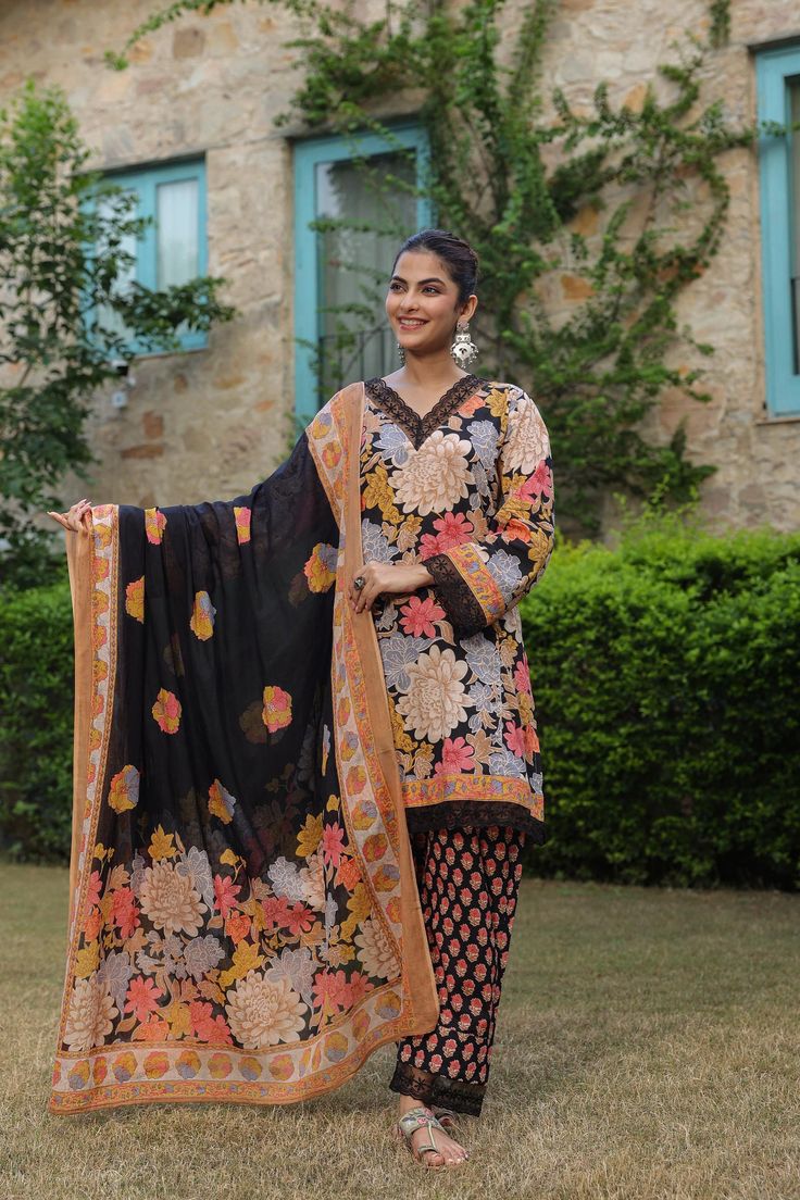 This beautiful  Handblock Kurta suit  set with straight pants and dupatta  is the most comfortable and classy Indian outfit. Soothing cotton fabric in this Jaipuri block print makes it very elegant.Jaipuri print floral black and floral dupatta set makes for a beautiful salwar suit set which is perfect for Indian occasions ,festivals an weddings. The pants a comfort fit with elastic band that makes the pants roomy. 3/4th sleeves with lace detailing and straight line kurta with beautiful lace make Jaipuri Dupatta, Floral Dupatta, Jaipuri Print, Kurti Sets, Indian Salwar Kameez, Indian Salwar, Kurti Set, Printed Kurti, Dupatta Set