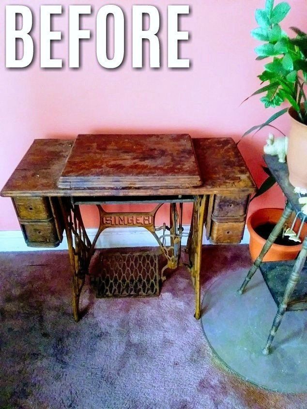 an old sewing table with a plant on top and a potted plant next to it