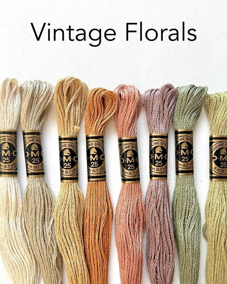 six skeins of different colored yarn with the words vintage florals on them