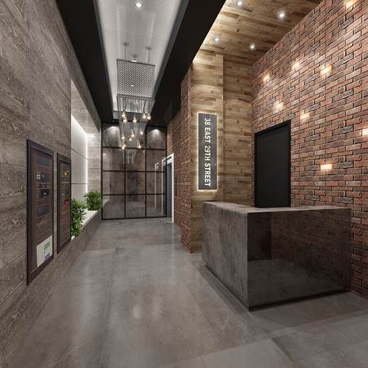 an empty lobby with brick walls and lights