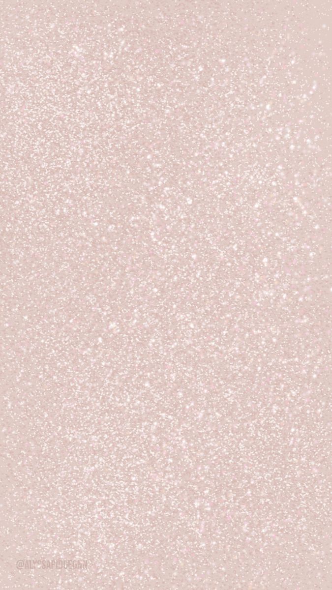 a pink background with white speckles on it