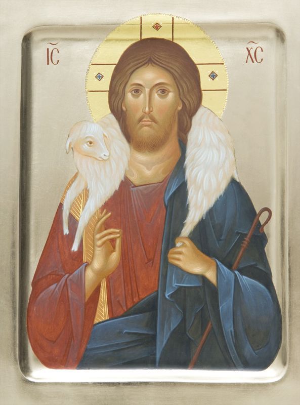 an icon of jesus holding a white bird