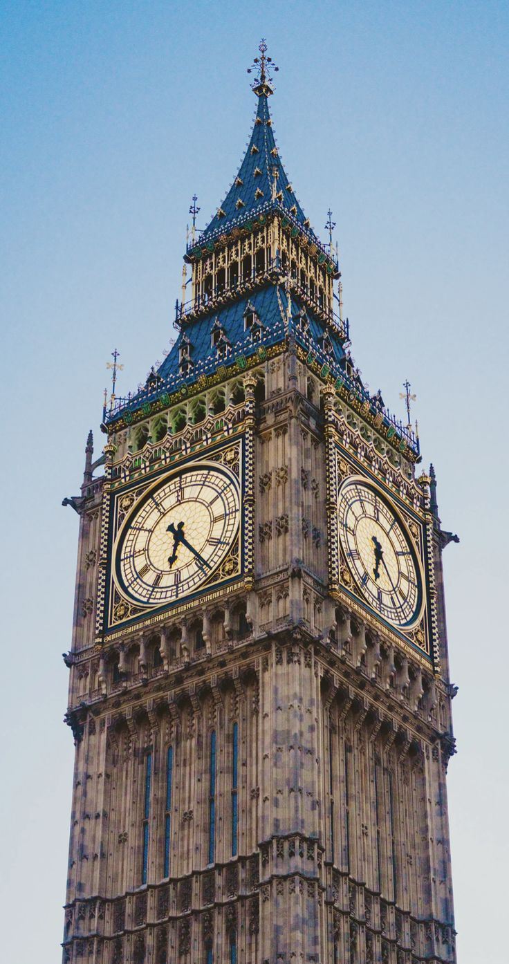 the big ben clock tower towering over the city of london