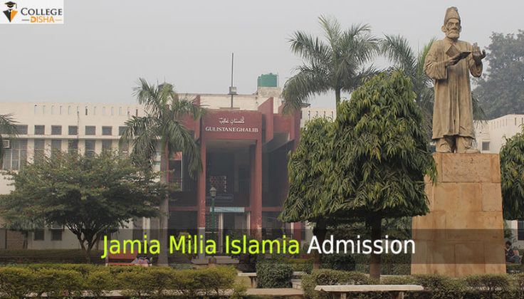 a statue in front of a building with palm trees and people walking around the area