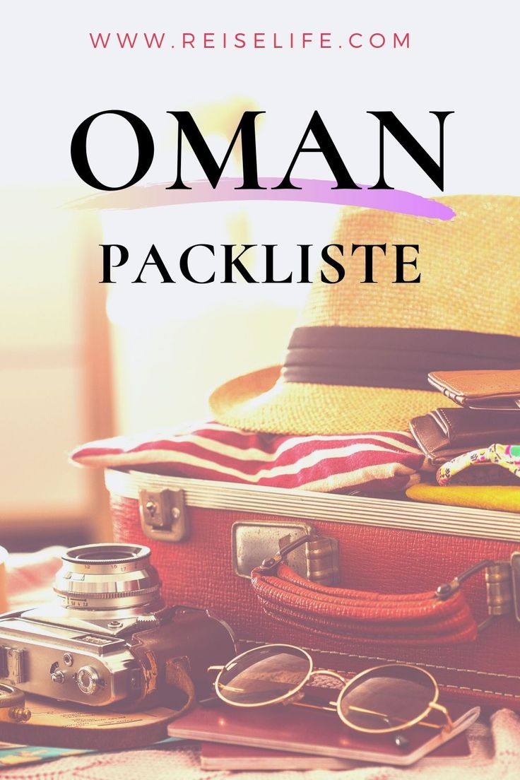 an open suitcase sitting on top of a bed next to a hat and sunglasses with the words oman package