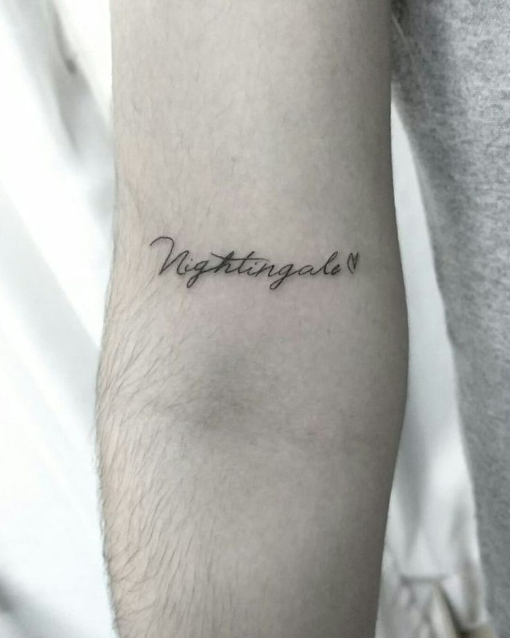 a man with a tattoo on his arm that says,'nottingdale '