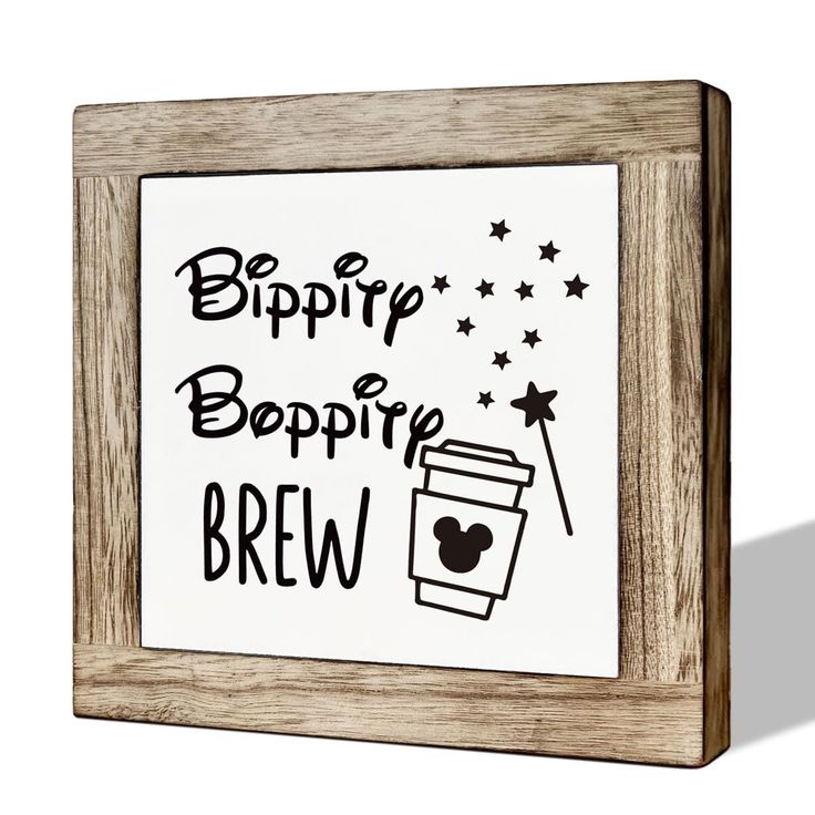 a wooden frame with the words sippy booppie brew written in black ink