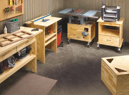 a workbench with many different tools on the table and drawers in front of it